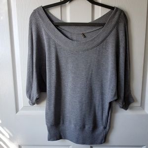 Scoop neck sweater-like top.